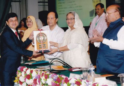 Receiving award from honorable Prime Minister Sheikh Hasina